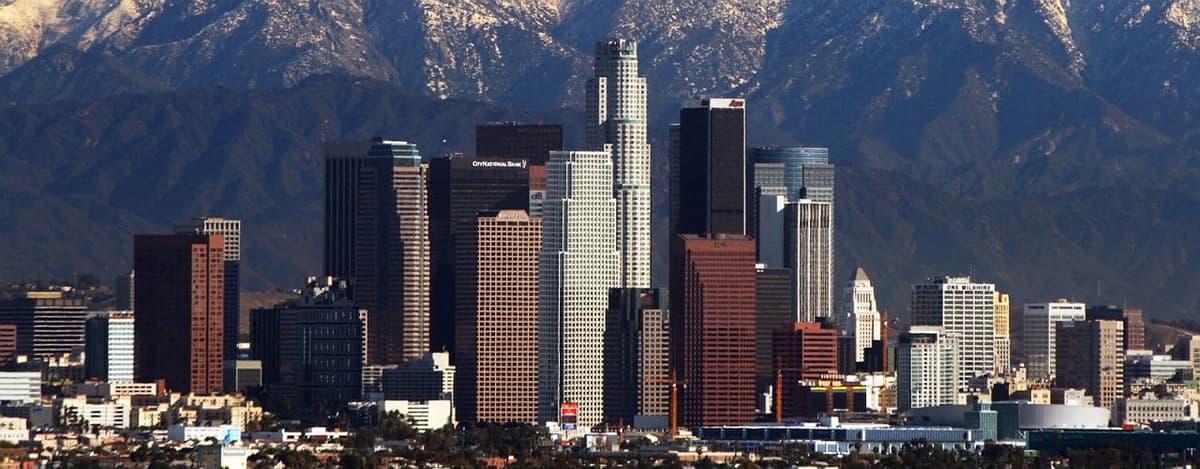 A close-up of a business handshake, symbolizing partnership and trust.